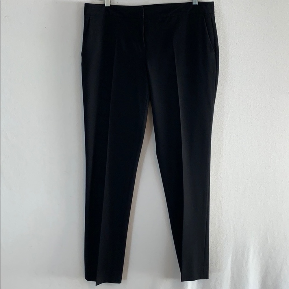 Vince Camuto’s black trousers size 8.